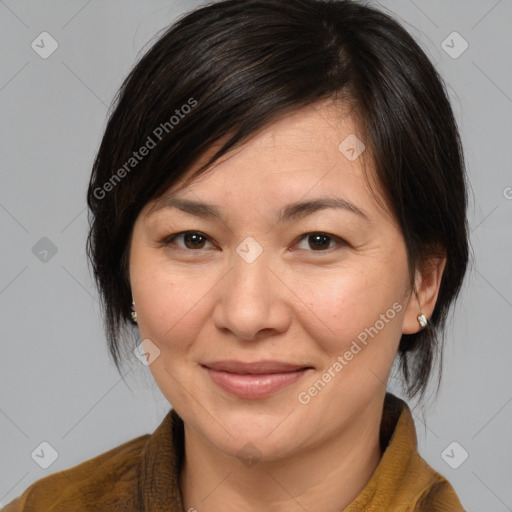 Joyful white adult female with medium  brown hair and brown eyes