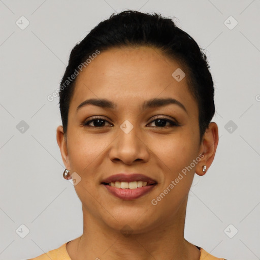 Joyful latino young-adult female with short  black hair and brown eyes