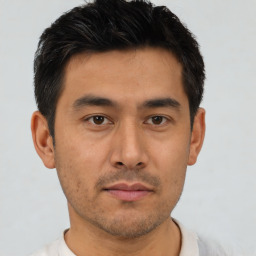 Neutral asian young-adult male with short  brown hair and brown eyes