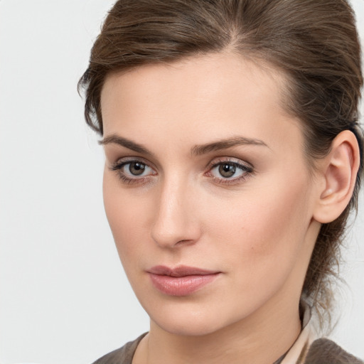 Neutral white young-adult female with medium  brown hair and grey eyes