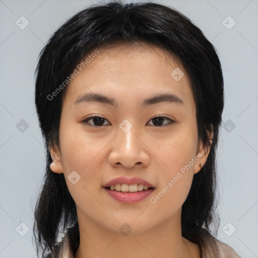 Joyful asian young-adult female with medium  brown hair and brown eyes