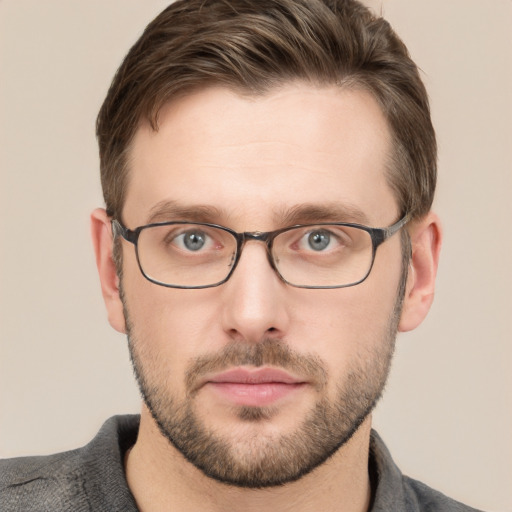 Neutral white young-adult male with short  brown hair and grey eyes