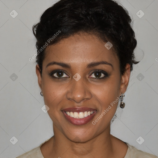 Joyful black young-adult female with short  brown hair and brown eyes