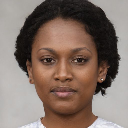 Neutral black young-adult female with short  black hair and brown eyes