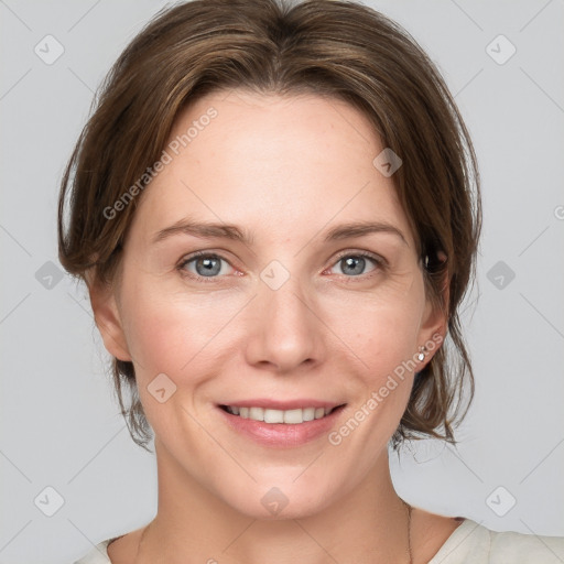 Joyful white adult female with medium  brown hair and grey eyes