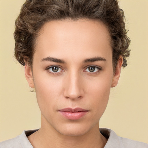 Neutral white young-adult female with short  brown hair and brown eyes