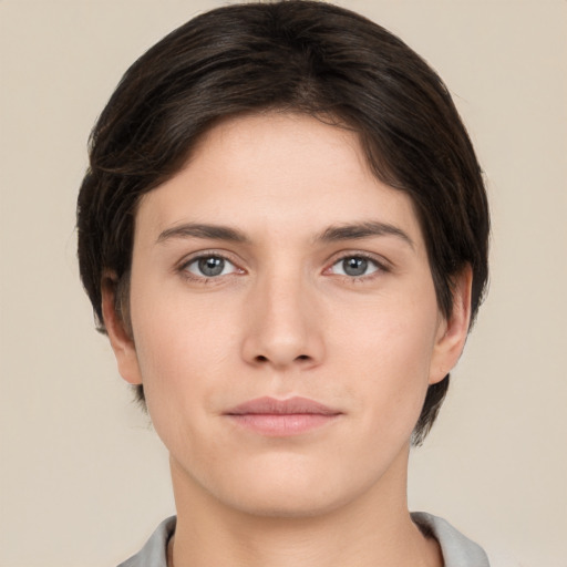 Neutral white young-adult female with short  brown hair and brown eyes