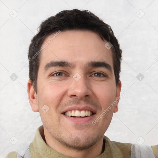 Joyful white young-adult male with short  black hair and brown eyes