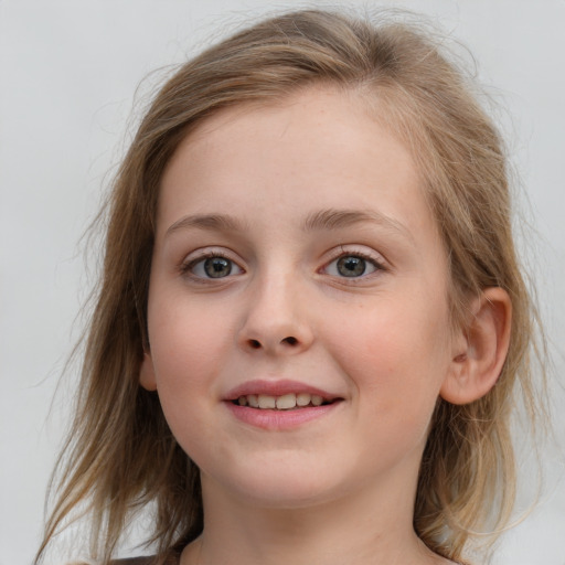 Joyful white child female with medium  brown hair and blue eyes