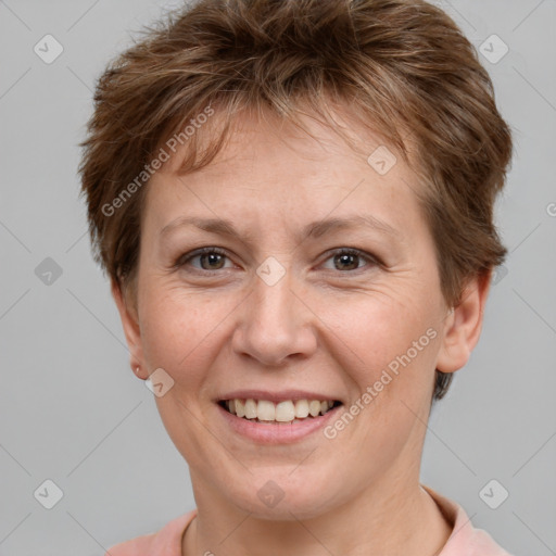 Joyful white adult female with short  brown hair and brown eyes