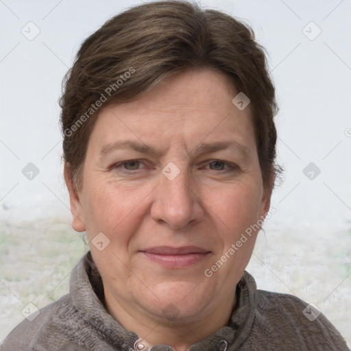 Joyful white adult female with short  brown hair and grey eyes