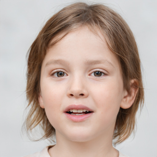 Joyful white child female with medium  brown hair and blue eyes