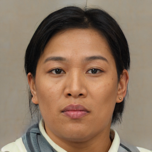 Neutral asian young-adult female with medium  brown hair and brown eyes