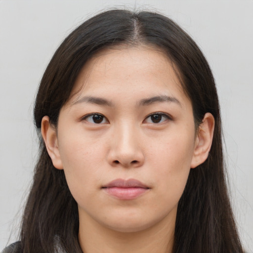 Neutral asian young-adult female with long  brown hair and brown eyes