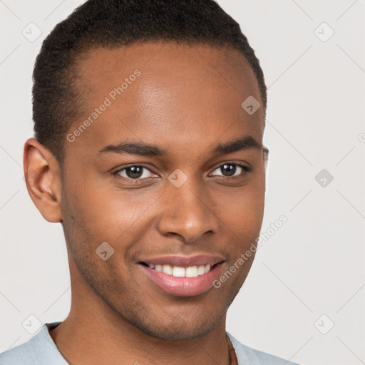 Joyful black young-adult male with short  brown hair and brown eyes