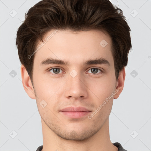 Neutral white young-adult male with short  brown hair and brown eyes