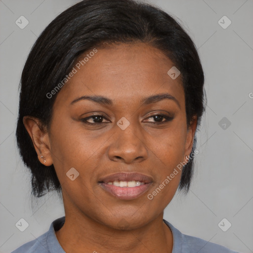 Joyful black adult female with medium  brown hair and brown eyes