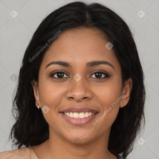 Joyful black young-adult female with medium  brown hair and brown eyes