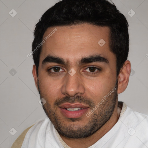 Joyful white young-adult male with short  black hair and brown eyes