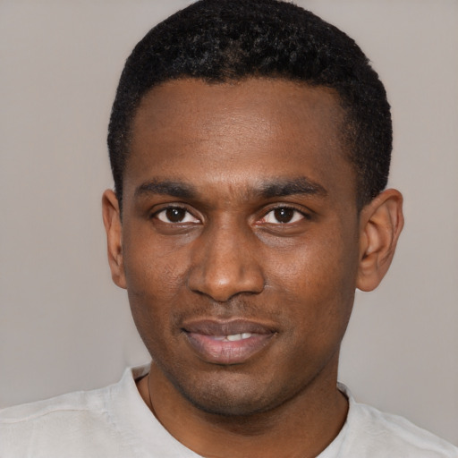 Neutral black young-adult male with short  black hair and brown eyes