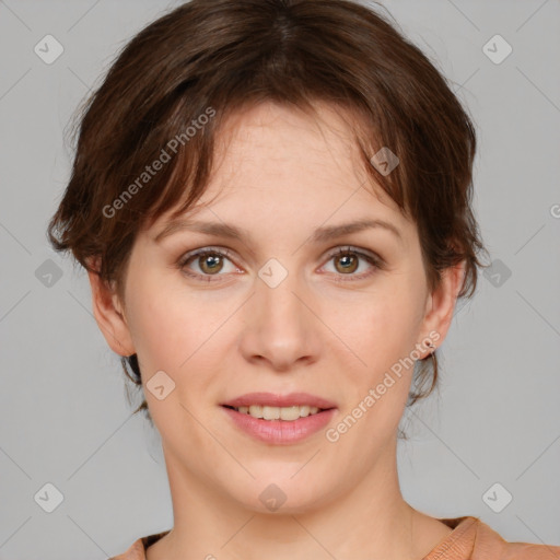 Joyful white young-adult female with medium  brown hair and green eyes