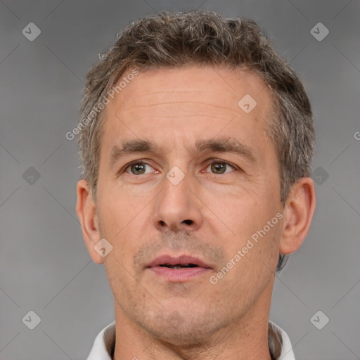 Neutral white adult male with short  brown hair and brown eyes