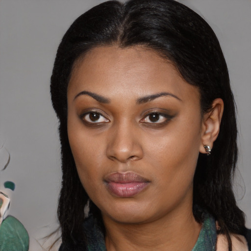 Neutral black young-adult female with long  brown hair and brown eyes