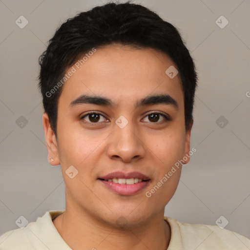 Joyful latino young-adult male with short  brown hair and brown eyes