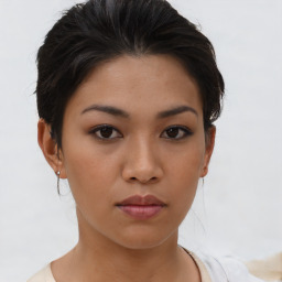 Neutral asian young-adult female with medium  brown hair and brown eyes