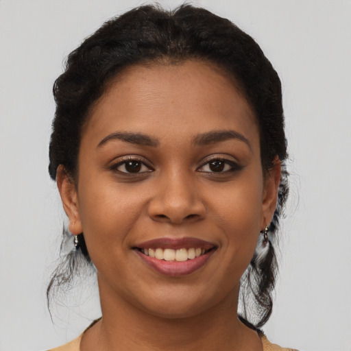 Joyful latino young-adult female with short  brown hair and brown eyes