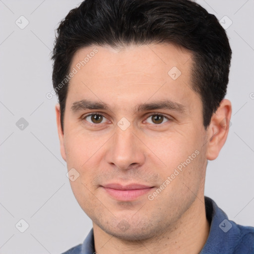 Joyful white young-adult male with short  brown hair and brown eyes