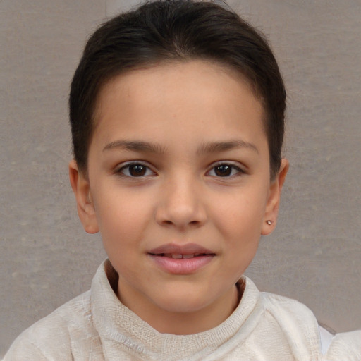 Joyful white child female with short  brown hair and brown eyes