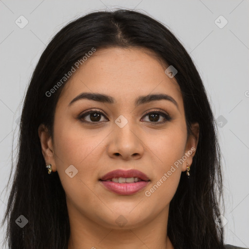 Joyful latino young-adult female with long  brown hair and brown eyes