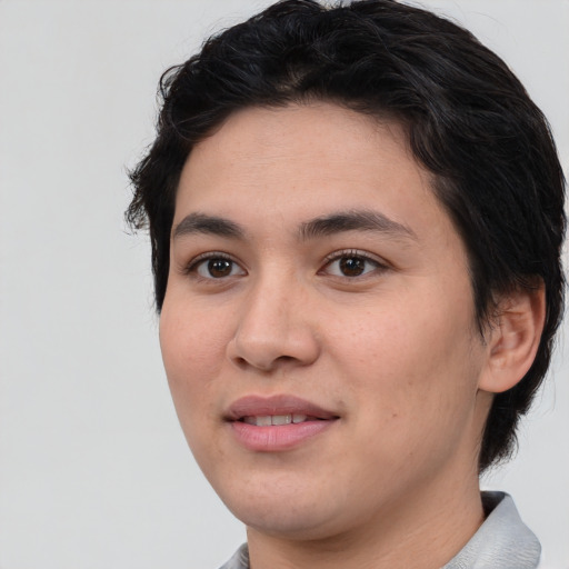 Joyful white young-adult female with short  black hair and brown eyes