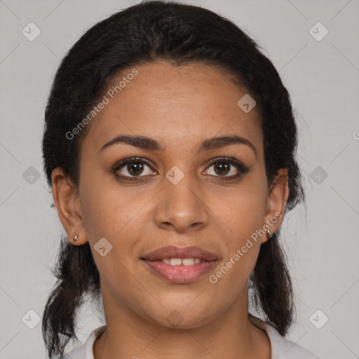 Joyful latino young-adult female with medium  brown hair and brown eyes