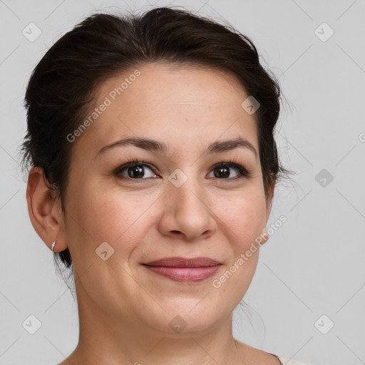 Joyful white adult female with medium  brown hair and brown eyes