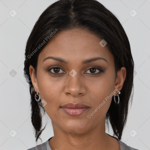 Joyful black young-adult female with medium  brown hair and brown eyes