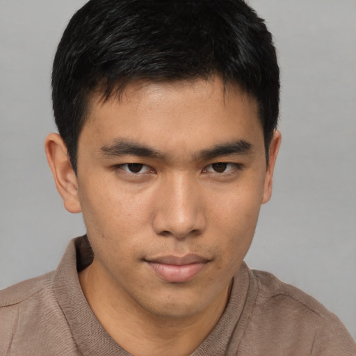 Neutral asian young-adult male with short  brown hair and brown eyes