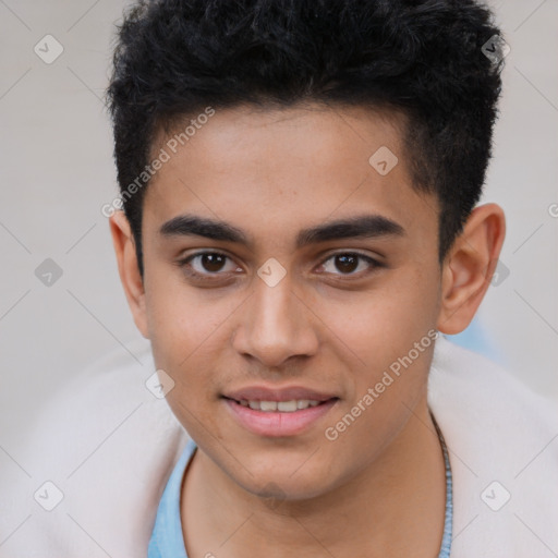 Joyful latino young-adult male with short  brown hair and brown eyes