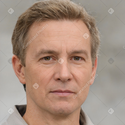 Joyful white adult male with short  brown hair and grey eyes