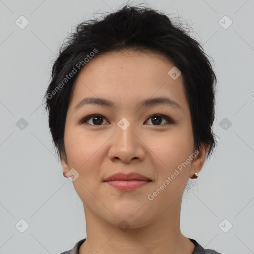 Joyful asian young-adult female with short  brown hair and brown eyes