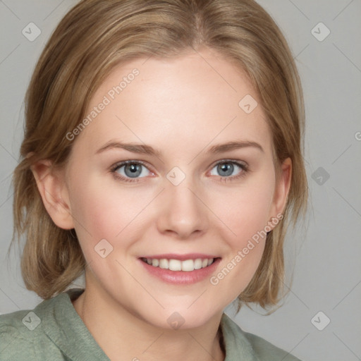 Joyful white young-adult female with medium  brown hair and blue eyes