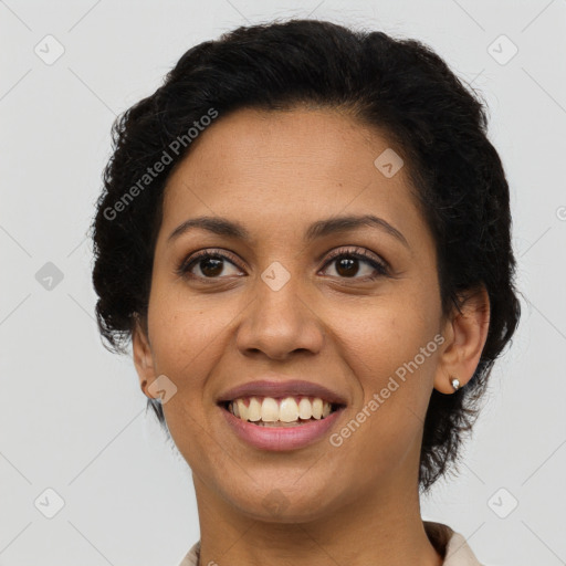 Joyful latino young-adult female with short  brown hair and brown eyes