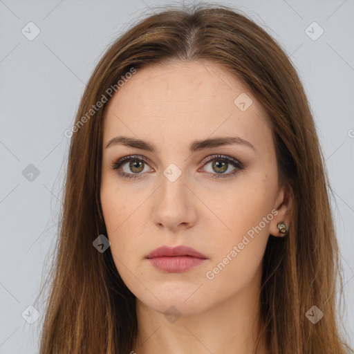 Neutral white young-adult female with long  brown hair and brown eyes