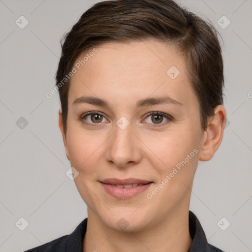 Joyful white young-adult female with short  brown hair and brown eyes