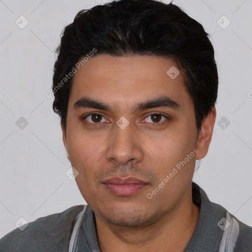 Neutral latino young-adult male with short  black hair and brown eyes