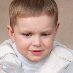 Joyful white child male with short  brown hair and brown eyes