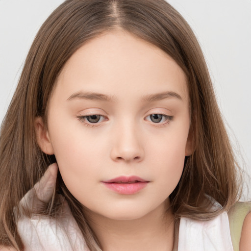 Neutral white child female with long  brown hair and brown eyes