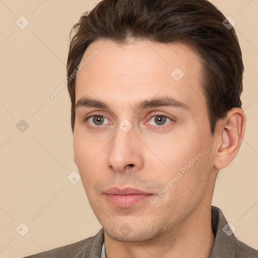 Neutral white young-adult male with short  brown hair and brown eyes