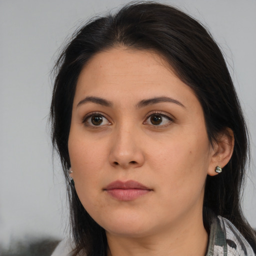 Neutral asian young-adult female with medium  brown hair and brown eyes